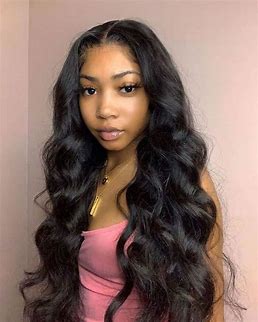 Woman wearing premium human hair bundles near me